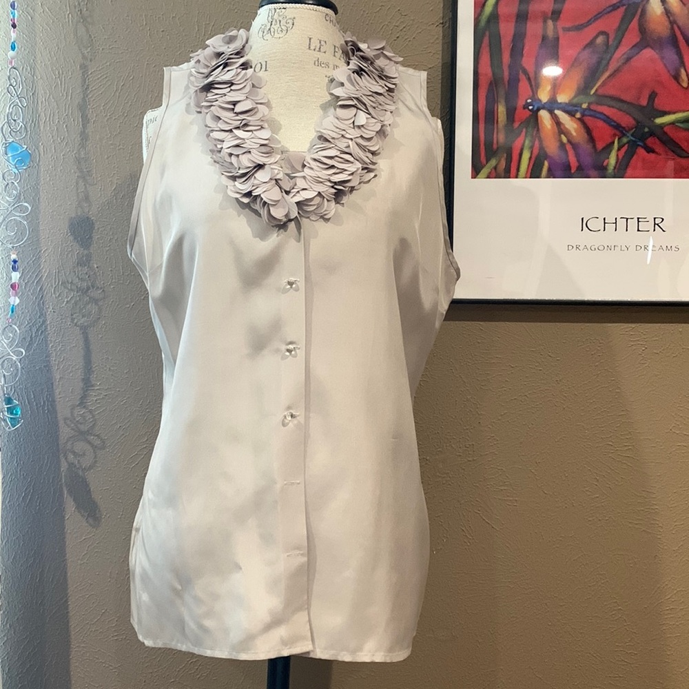 Ann Taylor sleeveless, silk top with glass buttons.